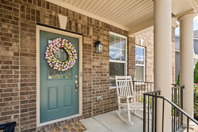 The front porch is the perfect spot to welcome guests