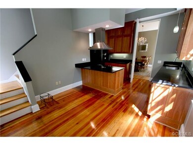 Modern Kitchen with cherry cabinets and granite