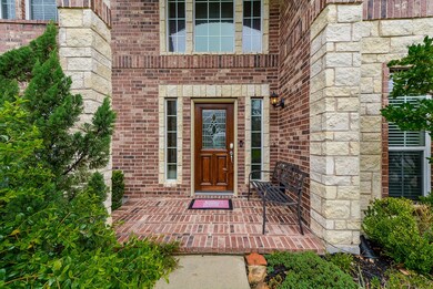 Wide and open front porch welcomes you and your visitors.