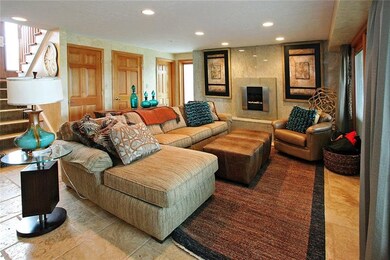Kitchen open to Living Room with custom granite fi