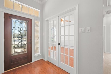 Double French doors to the office/4th bedroom.