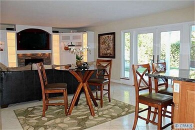Informal dining area next to family room and kitch