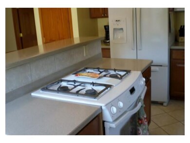 Kitchen. Dual fuel built in oven/range.  Corian co