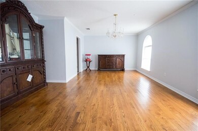 Formal dining room is very large and bright!