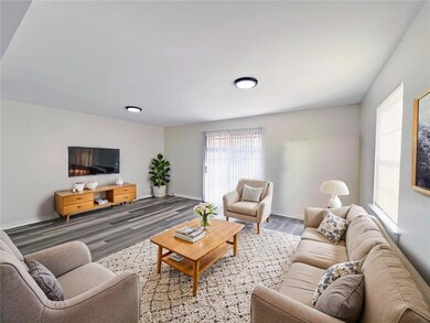Living room is virtually staged.