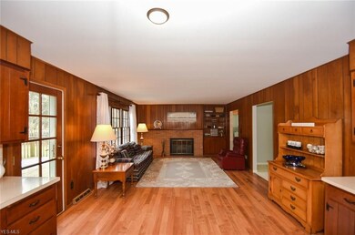 Kitchen and Family Room with convenient door to th