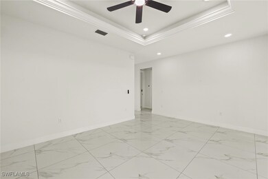Unfurnished room with light marble finish flooring