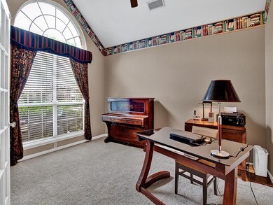 The carpeted study greets you as you enter the hom