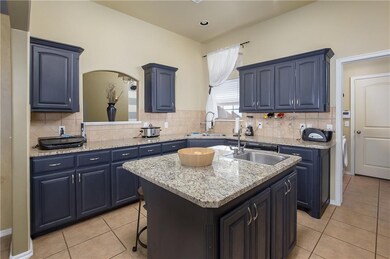 Kitchen with island & two sinks