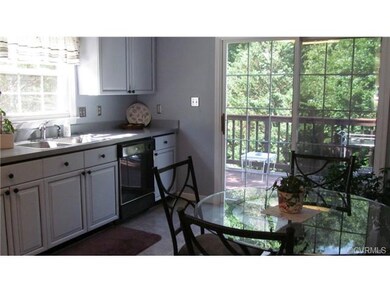 Kitchen with sliding glass doors to the deck