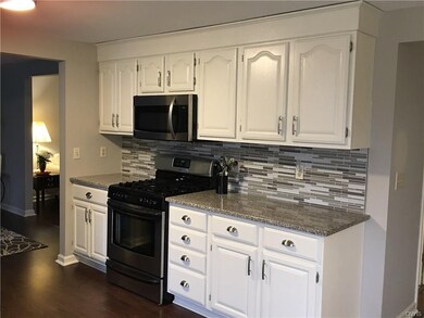 Newer stainless steel appliances in the kitchen.