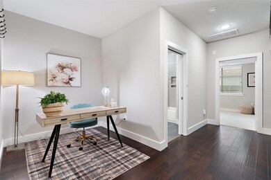 Home office featuring baseboards, visible vents, 