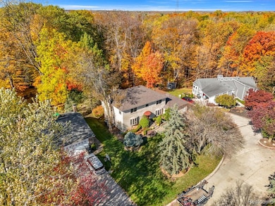 View of subject property featuring a forest