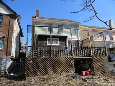 Exterior Back. Nice deck off kitchen