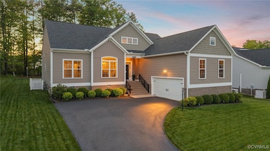 Craftsman-style house featuring driveway, a shingl