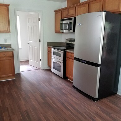 Stove side of kitchen and laundry