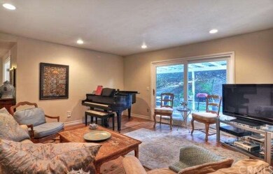 An oversized living room with upgraded sliding doo