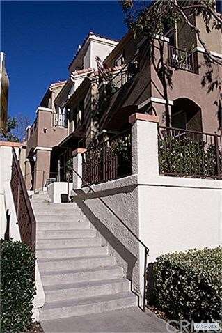 Step up to your beautiful condo in the Corte Melin