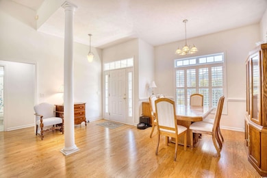 Dining room with a notable chandelier, decorative 