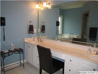 Master Bath has double vanity with make up area.