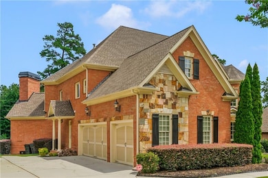 View of front of home featuring a garage