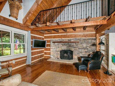 The stone fireplace is the focus point of the Grea