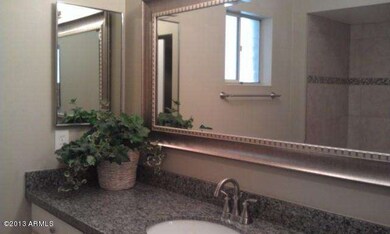 Granite counters, fixtures and mirror
