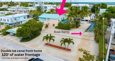 Large double lot canal front home