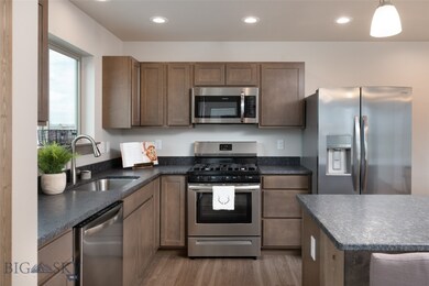 Stainless steel appliances with Gas range.