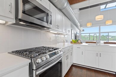 Kitchen featuring appliances with stainless steel