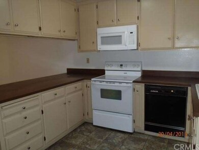 Newer range, microwave, dishwasher, cupboards.