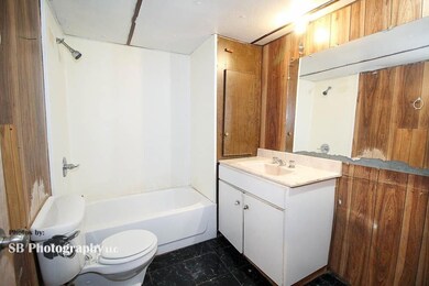 Full bathroom featuring tile floors, bathtub / sho
