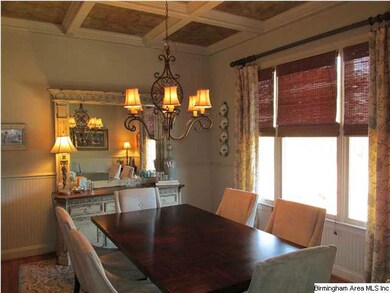 Lovely Separate Dining Room featuring Coffered Cei