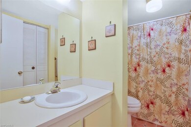 easy care tile floors and a large linen closet