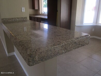 Granite slab countertops & breakfast bar