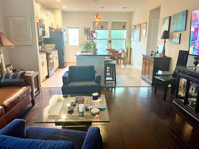 Living room with light wood-style floors, recesse