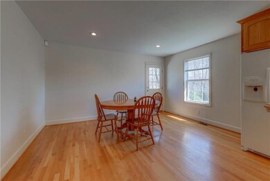 Dining area with door to deck.  All vinyl windows 