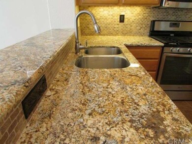 Mesmerizing granite and back splash patterns make 