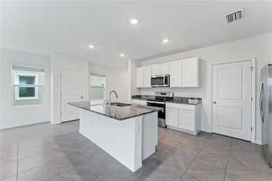 30753 Penny Surf Loop, Wesley Chapel, FL 33545 - photo 2