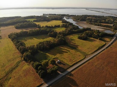 View of property location with a large body of water