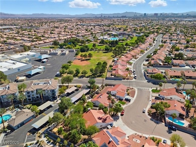 Aerial view of residential area with a mountainous background