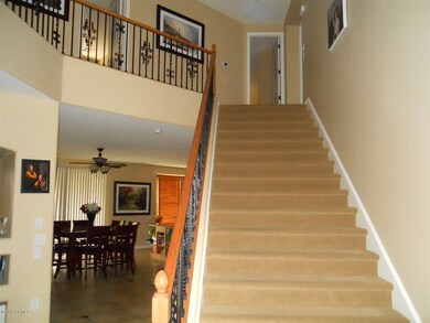 Wide Staircase w/Wrot Iron Railing