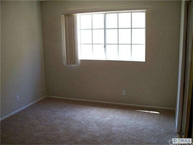 Bedroom 1, with new paint and carpet.