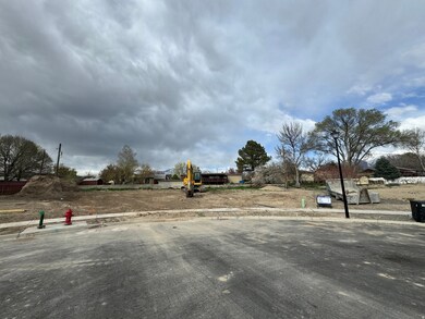 View of asphalt street with curbs and sidewalks