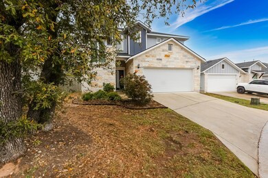 Traditional-style house featuring stone siding, b