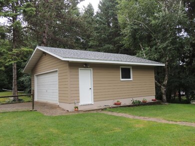 2 car garage with new siding, soffit, fascia & roo
