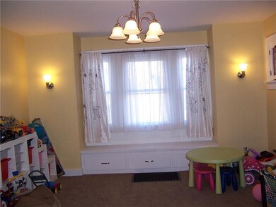 Dining room is currently used as a playroom but wi