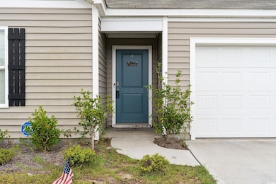 Property entrance with a garage