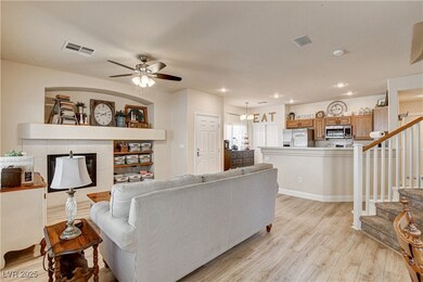 Living room with light wood-style floors, ceiling