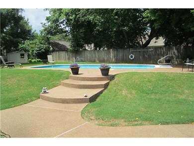 Relax in the pool which is the centerpiece of the 